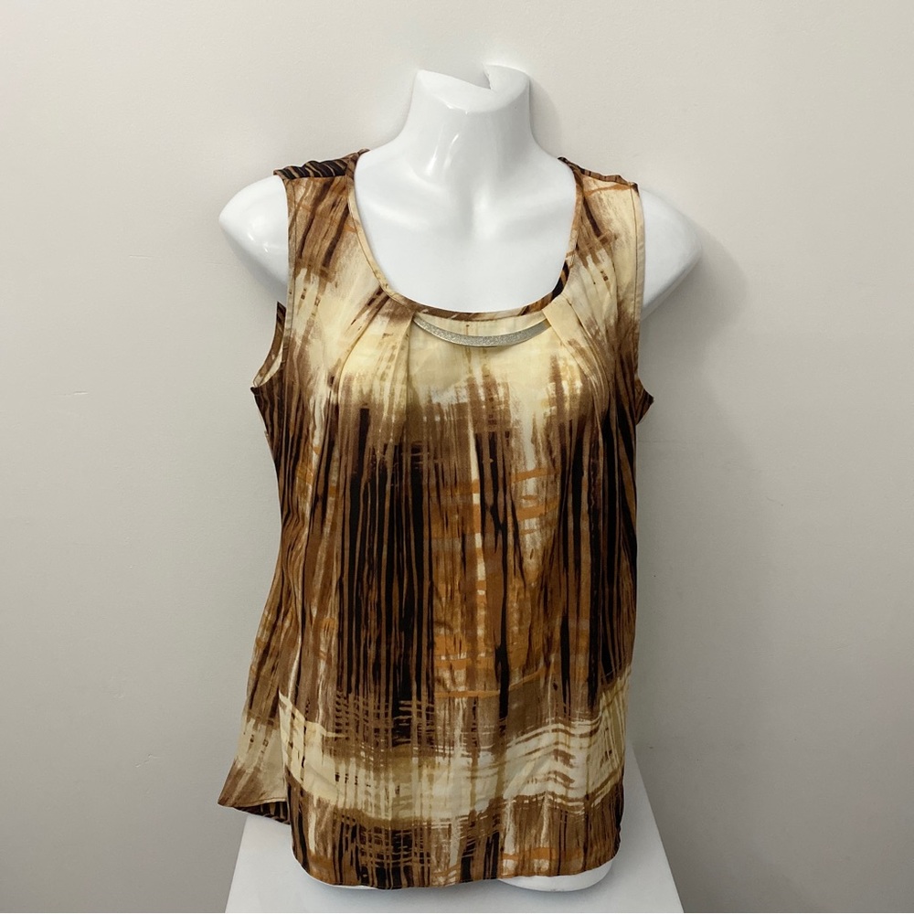 Sioni blouse size small. Made in Indonesia.  Very nice condition. See photos.